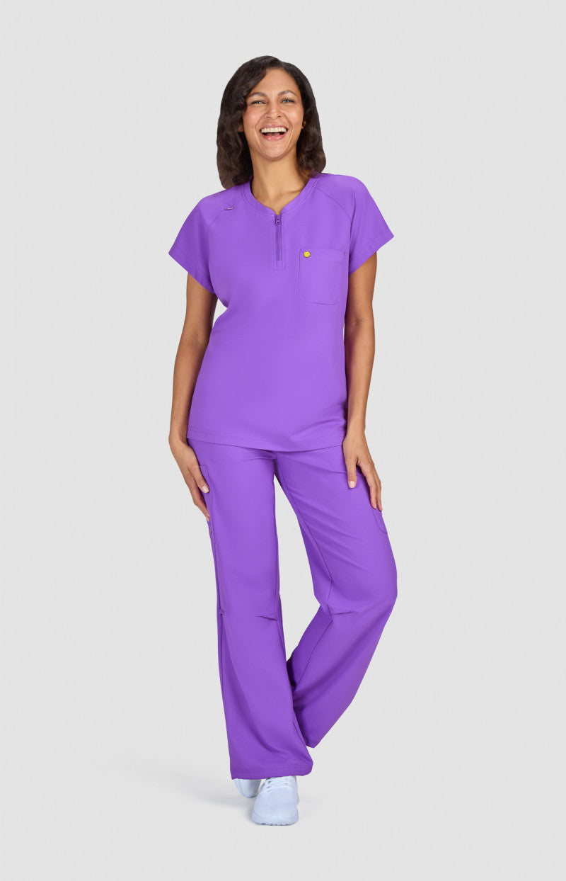 koi | SmileyWorld Ecstatic Women's 1-Pocket Zipper-Neck Scrub Top
