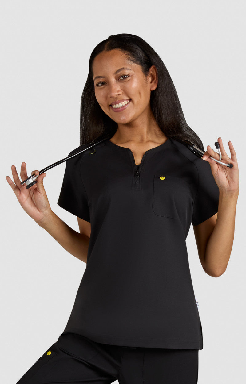 koi | SmileyWorld Ecstatic Women's 1-Pocket Zipper-Neck Scrub Top