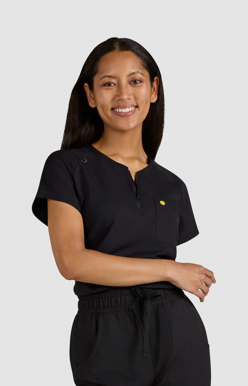 koi | SmileyWorld Ecstatic Women's 1-Pocket Zipper-Neck Scrub Top